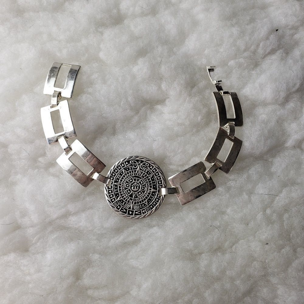 Silver embellished link bracelet with large charm